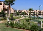 Outside Garden to swimming pool and padel court